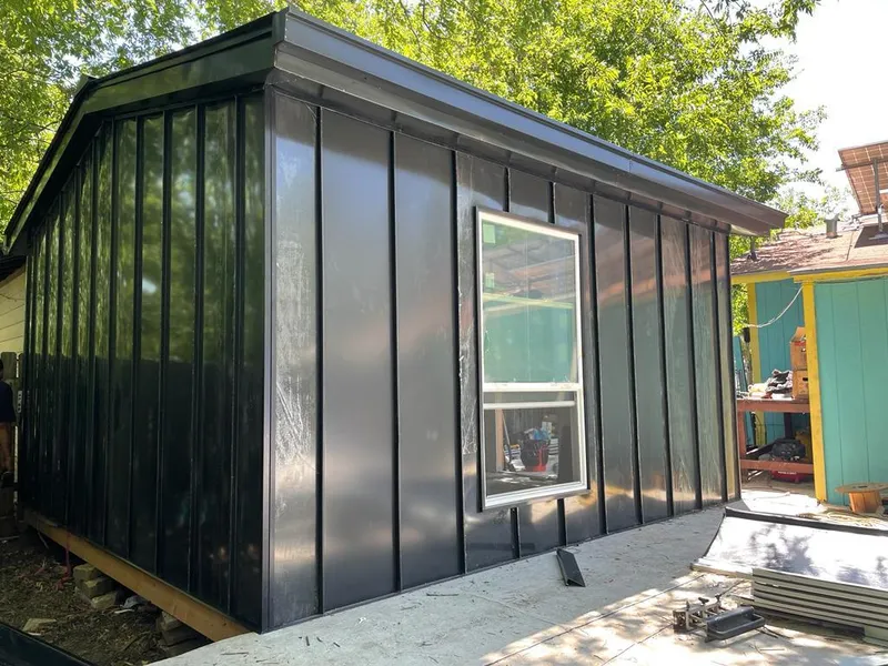 Black standing seam metal wall panels for Roof Inspection in Palos Hills