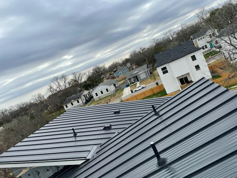 Standing seam metal roof panels with vents for Skylight Repair in Palos Hills